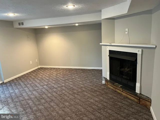 a view of a building with a yard