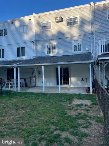 a view of backyard with green space