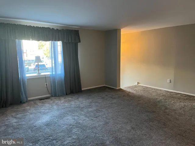 a view of a livingroom with a fireplace
