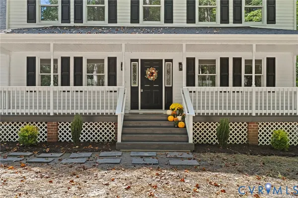 front view of a house with a large window