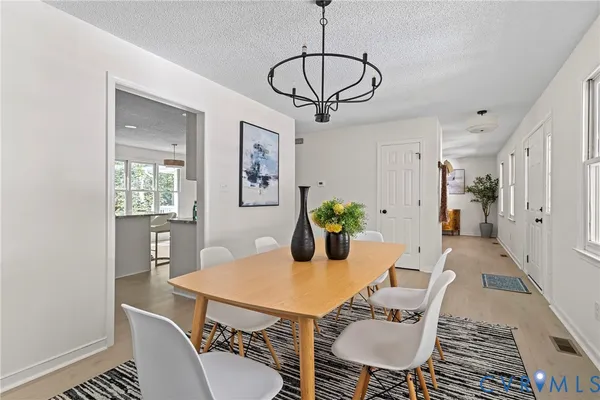 a view of a dining room with furniture