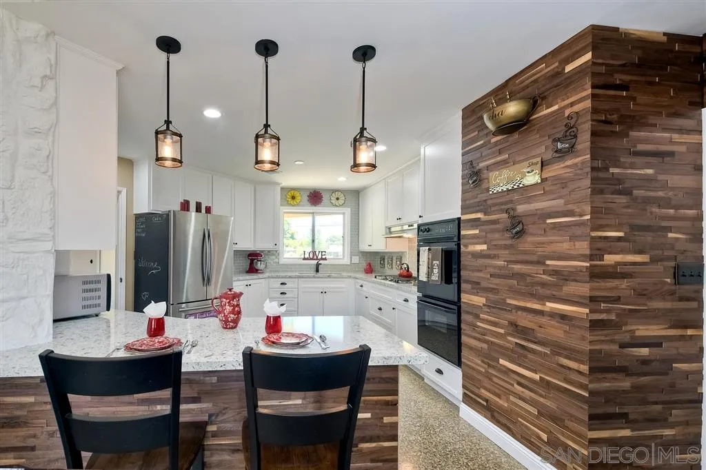 1651 Highlands View Road Alpine, CA 91901 - Photo 12 of 25 a dining room with furniture and wooden floor