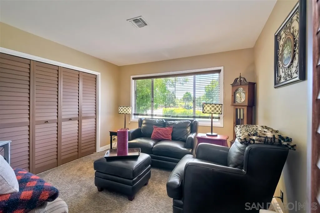 1651 Highlands View Road Alpine, CA 91901 - Photo 16 of 25 a living room with furniture and a large window