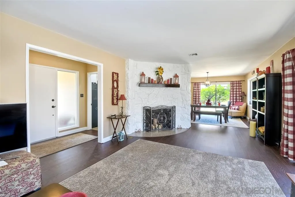 1651 Highlands View Road Alpine, CA 91901 - Photo 6 of 25 a living room with furniture and a fireplace
