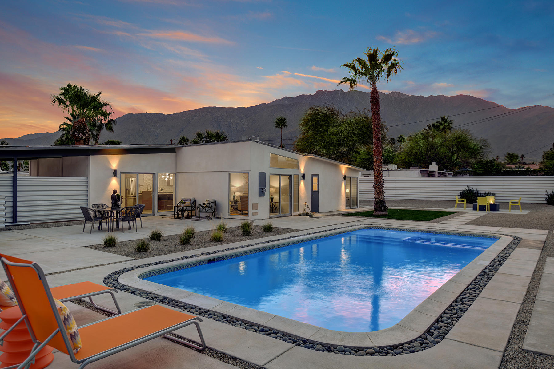 POOL TO HOUSE AND MOUNTAINS DUSK MLS
