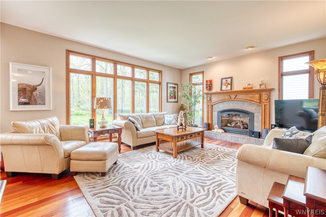4535 Lower River Road Lewiston, NY 14092 - Photo 11 of 32 Great Room with gleaming hard wood floors and cust