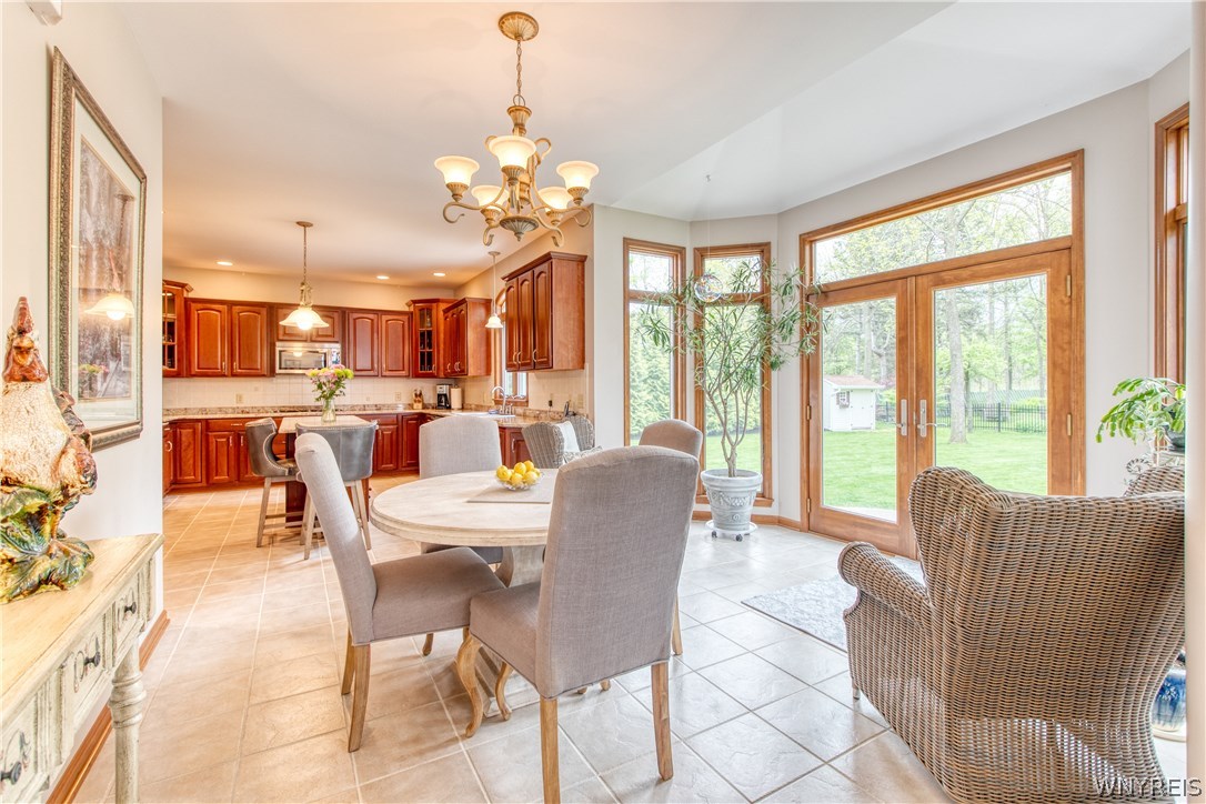 4535 Lower River Road Lewiston, NY 14092 - Photo 13 of 32 Kitchen with granite counters, cherry cabinets wit