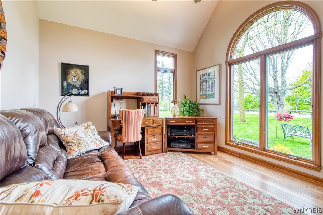 4535 Lower River Road Lewiston, NY 14092 - Photo 15 of 32 Den with brazilian cherry floors