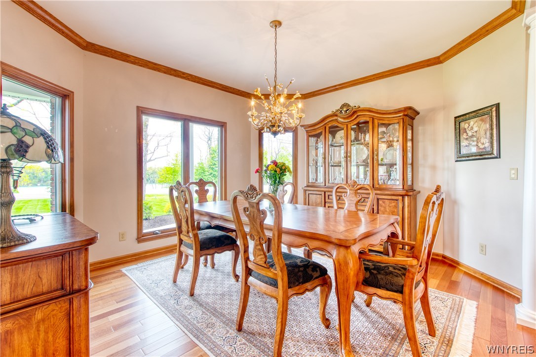 4535 Lower River Road Lewiston, NY 14092 - Photo 16 of 32 Formal dining room with Brazilian cherry floors