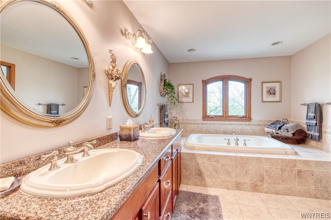 4535 Lower River Road Lewiston, NY 14092 - Photo 22 of 32 Master bath with granite counters and whirlpool tu
