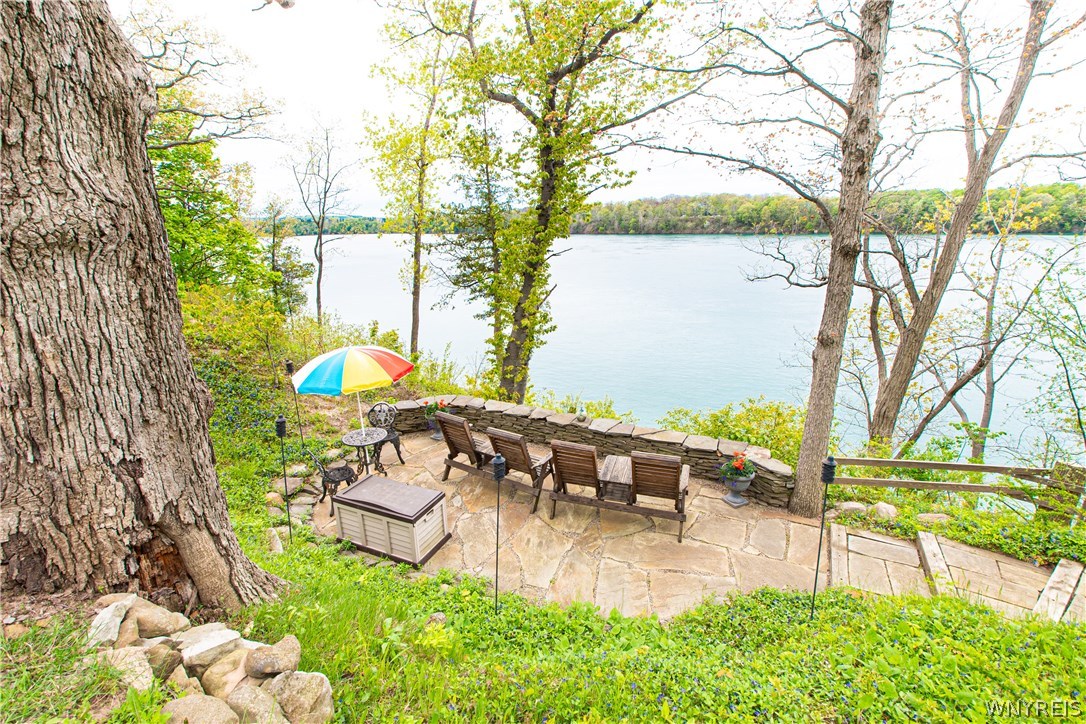 4535 Lower River Road Lewiston, NY 14092 - Photo 5 of 32 Riverside patio overlooking the river and Canadian