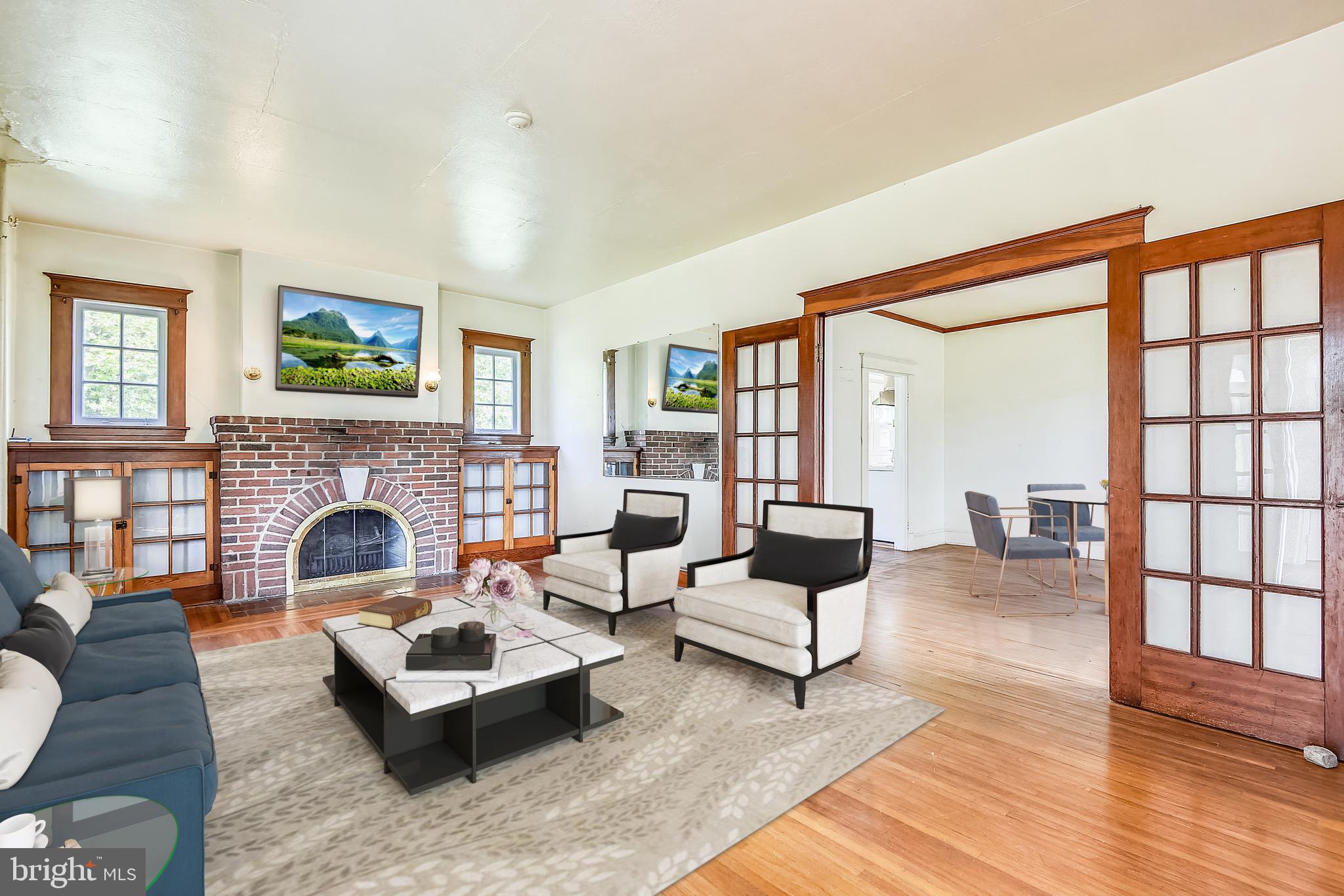 502 Ferry Point Road Annapolis, MD 21403 - Photo 16 of 28 Living Room with wood burning fireplace