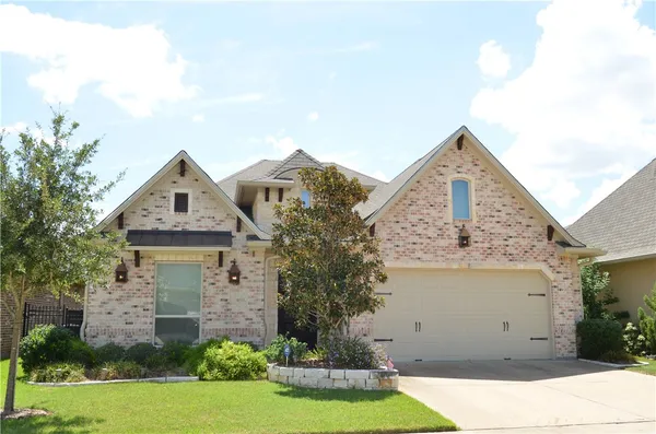 front view of house with a yard