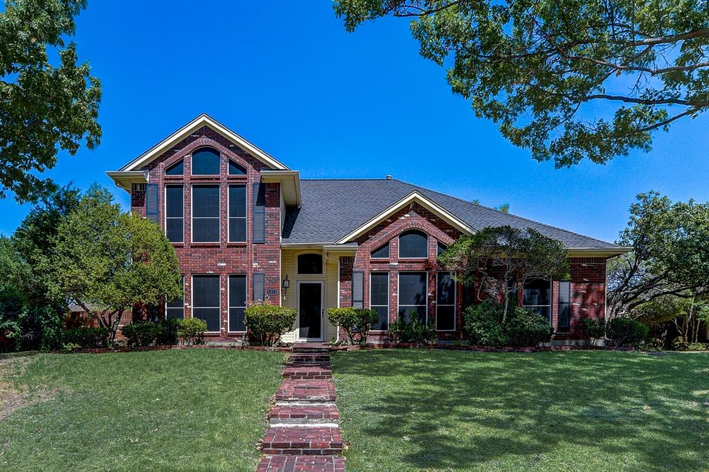 5914 Kittyhawk Drive Rowlett, TX 75089 - Photo 1 of 1 a front view of a house with a yard