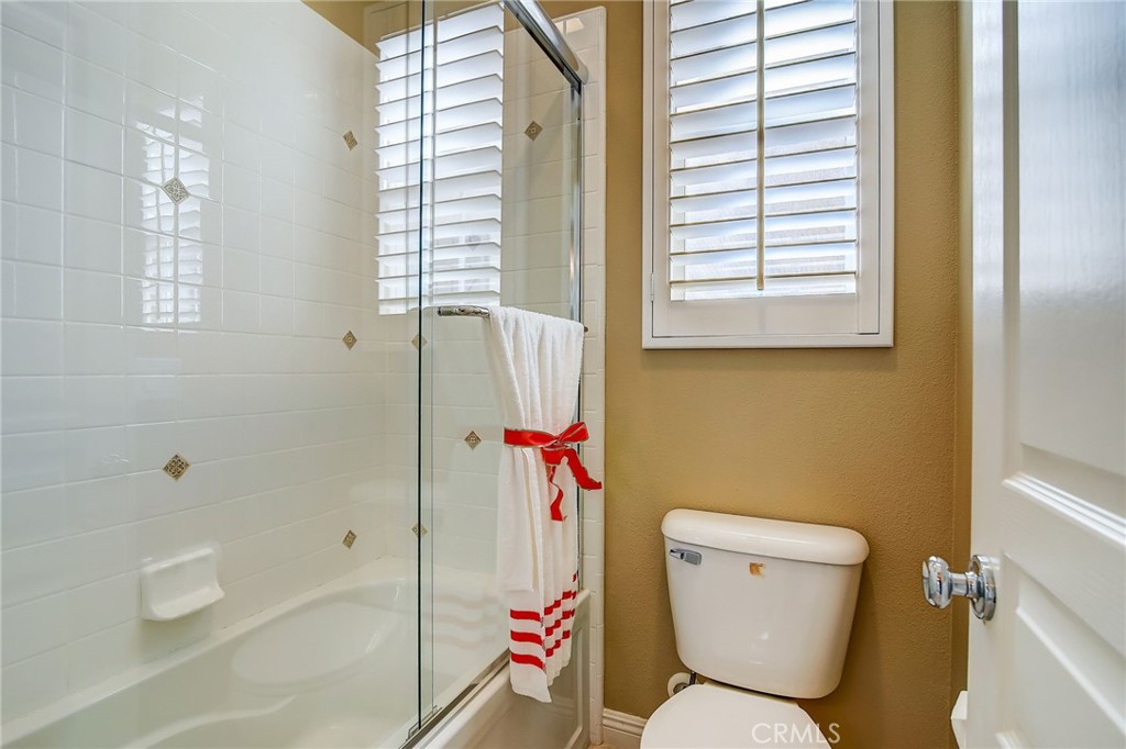 47 Snowdrop Tree Irvine, CA 92606 - Photo 17 of 29 a bathroom with a toilet and a shower