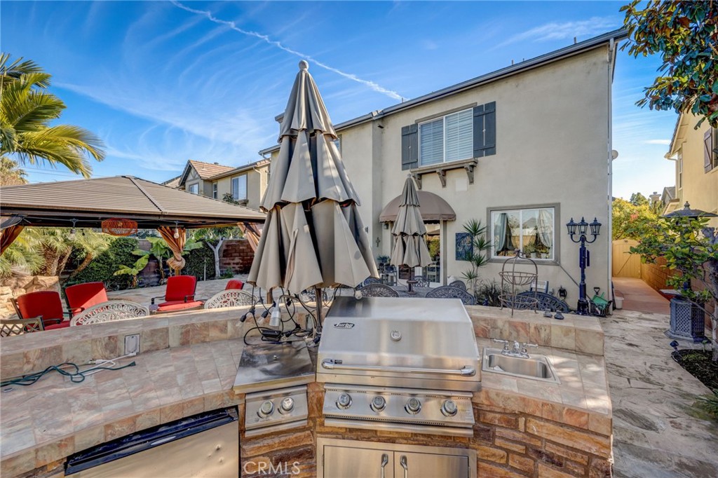 47 Snowdrop Tree Irvine, CA 92606 - Photo 22 of 29 a view of storage and utility room