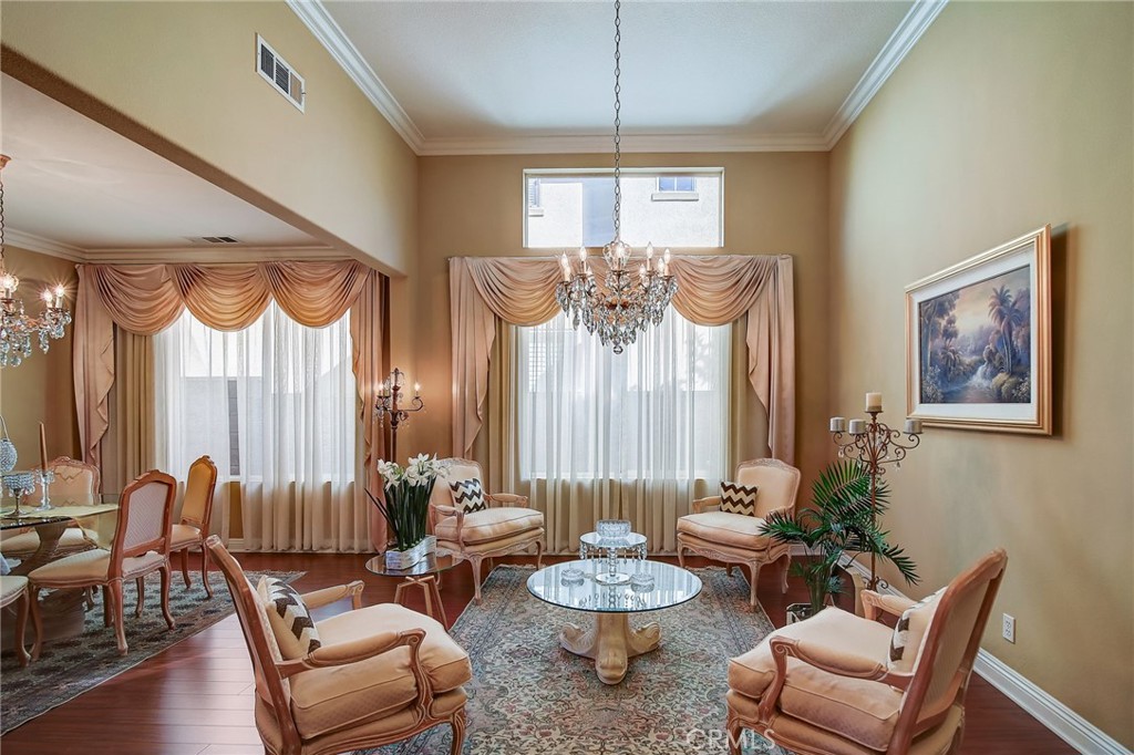 47 Snowdrop Tree Irvine, CA 92606 - Photo 6 of 29 a living room with furniture and a large window