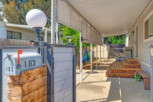a view of living room and patio area