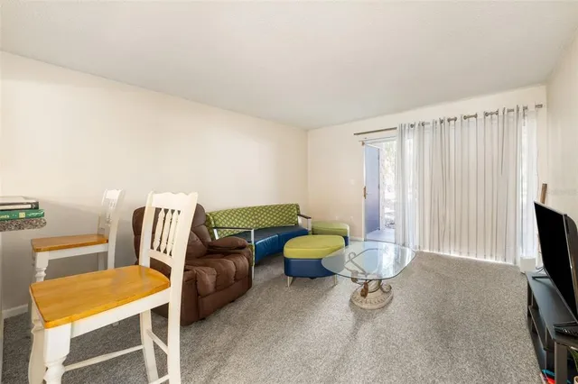 a bathroom with a toilet a sink and a mirror