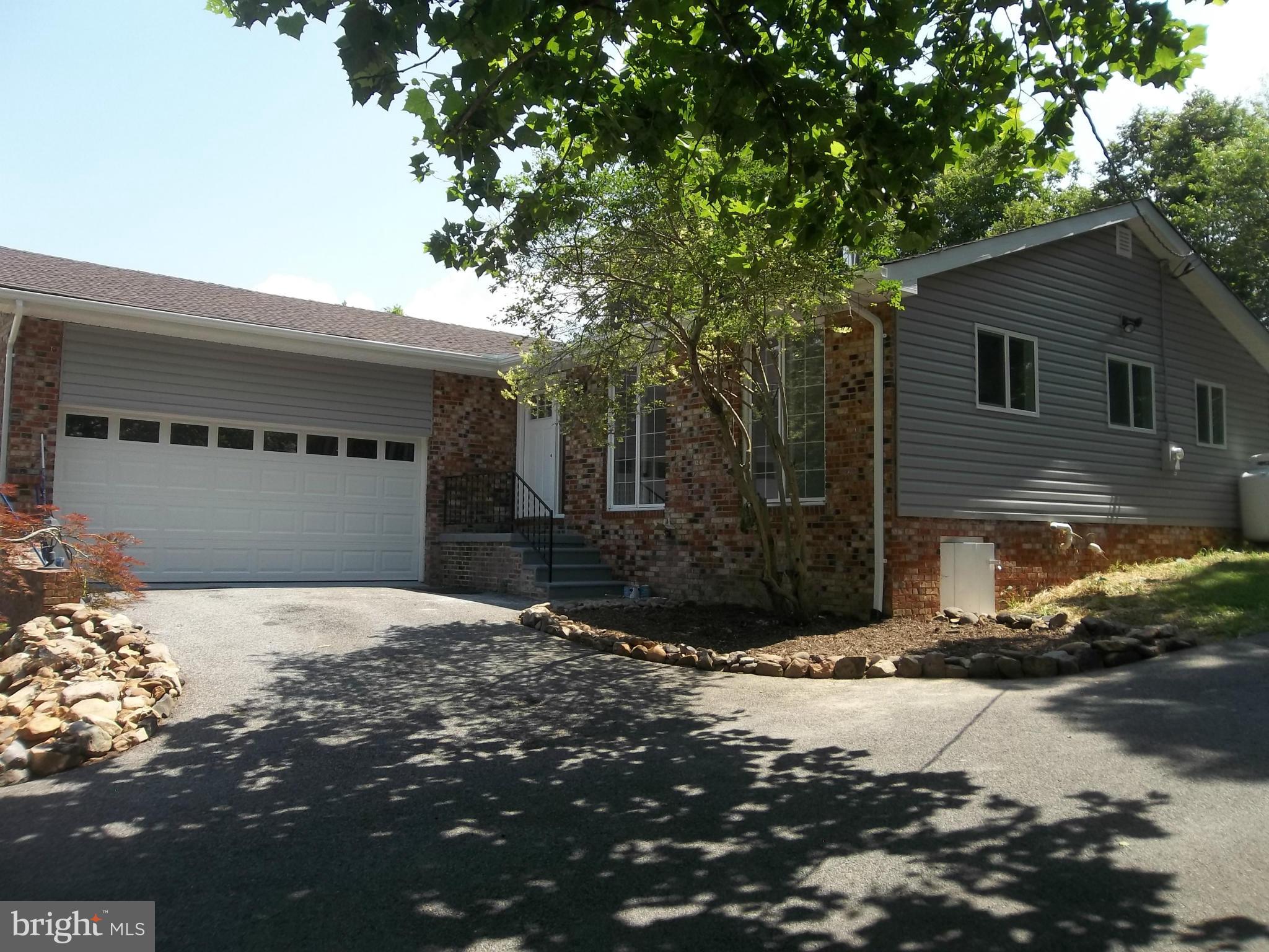 6038 Howellsville Road Front Royal, VA 22630 - Photo 2 of 30 a backyard of a house