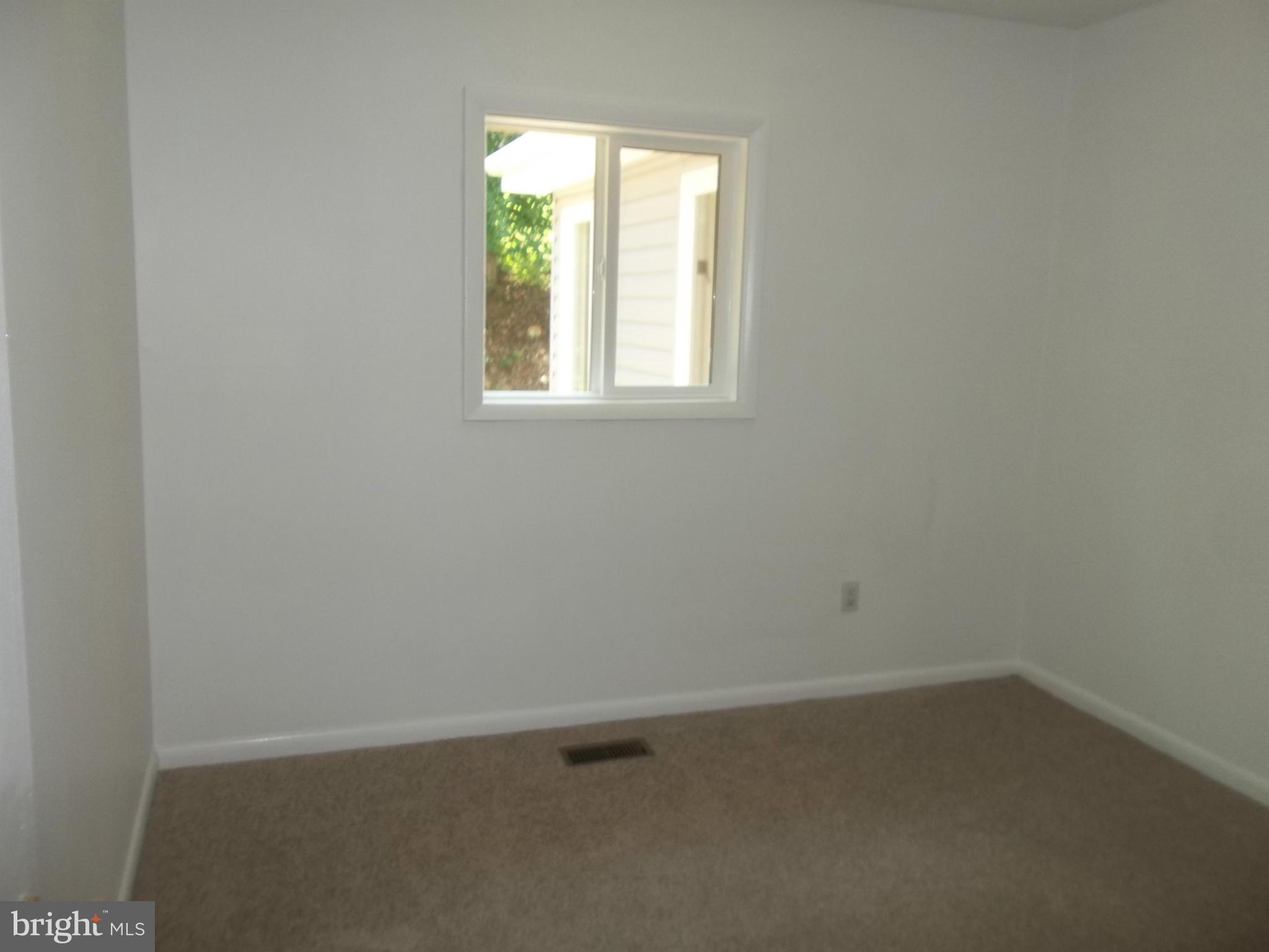 6038 Howellsville Road Front Royal, VA 22630 - Photo 26 of 30 an empty room with a window