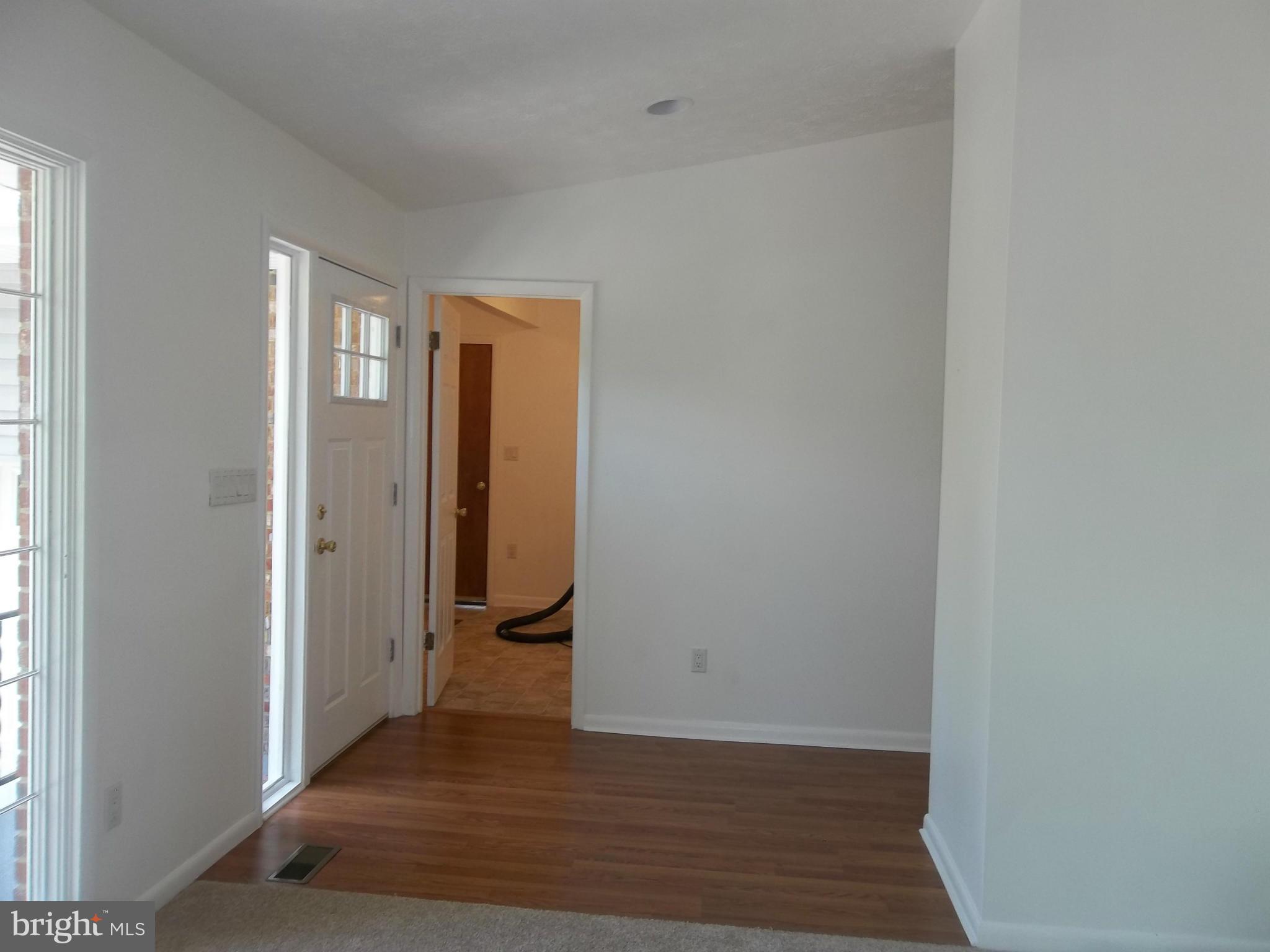 6038 Howellsville Road Front Royal, VA 22630 - Photo 10 of 30 a view of a hallway with wooden floor and closet