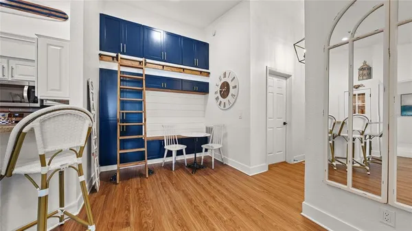 a view of a livingroom with furniture and front door