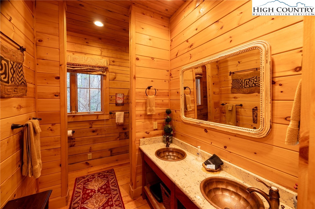 725 Fox Den Road Blowing Rock, NC 28605 - Photo 22 of 44 view of a bathroom with a sink and mirror