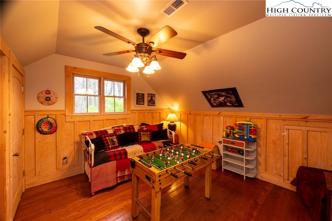 725 Fox Den Road Blowing Rock, NC 28605 - Photo 31 of 44 a living room with furniture and wooden floor
