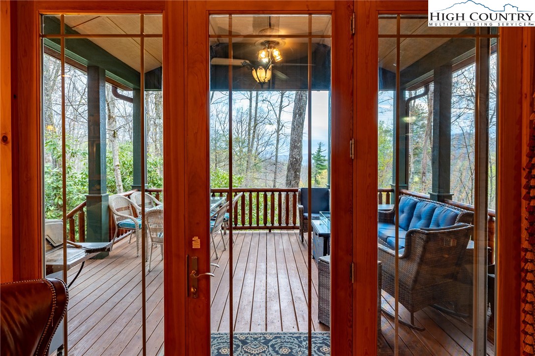 725 Fox Den Road Blowing Rock, NC 28605 - Photo 10 of 44 a view of a balcony with wooden floor