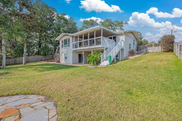 a view of a house with a big yard