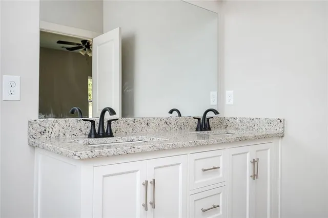 an empty room with mirror in it