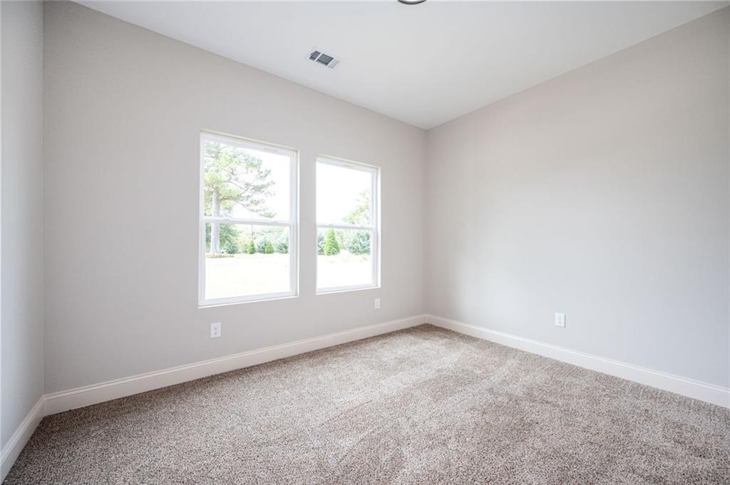 301 C W Sims Road Hiram, GA 30141 - Photo 20 of 29 an empty room with a window