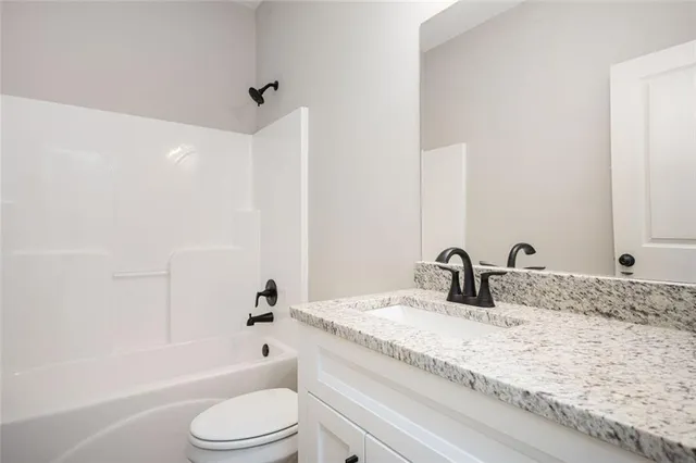 a house with trees in the background