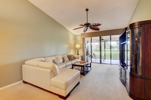 a bedroom with a bed and lamp