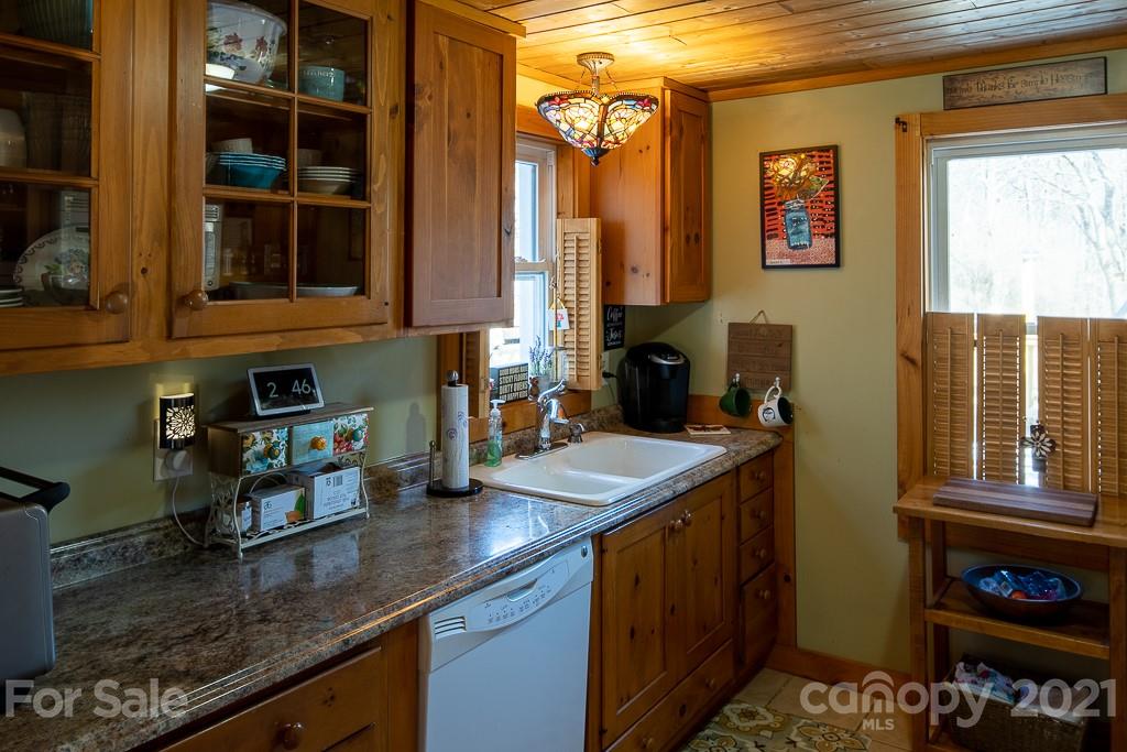 1321 Orchard Road Deep Gap, NC 28618 - Photo 14 of 40 a kitchen with sink and window