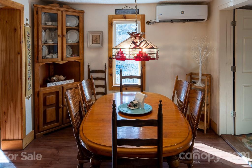 1321 Orchard Road Deep Gap, NC 28618 - Photo 22 of 40 a dining room with furniture and window
