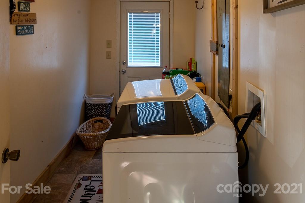 1321 Orchard Road Deep Gap, NC 28618 - Photo 23 of 40 a view of a sink and a mirror