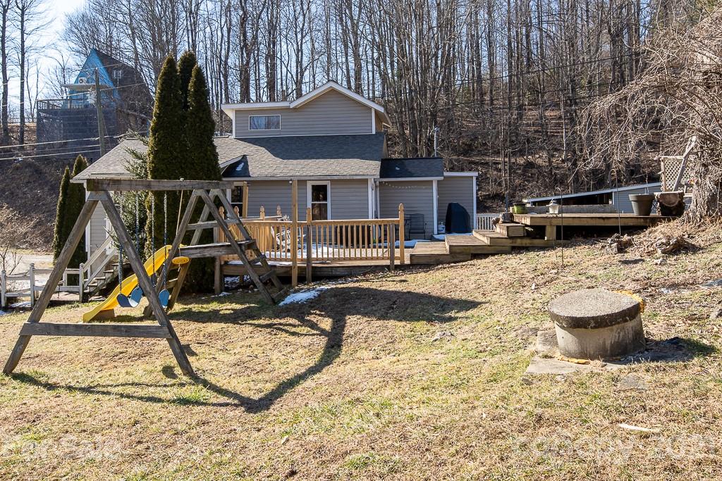 1321 Orchard Road Deep Gap, NC 28618 - Photo 39 of 40 a view of a patio with wooden chairs