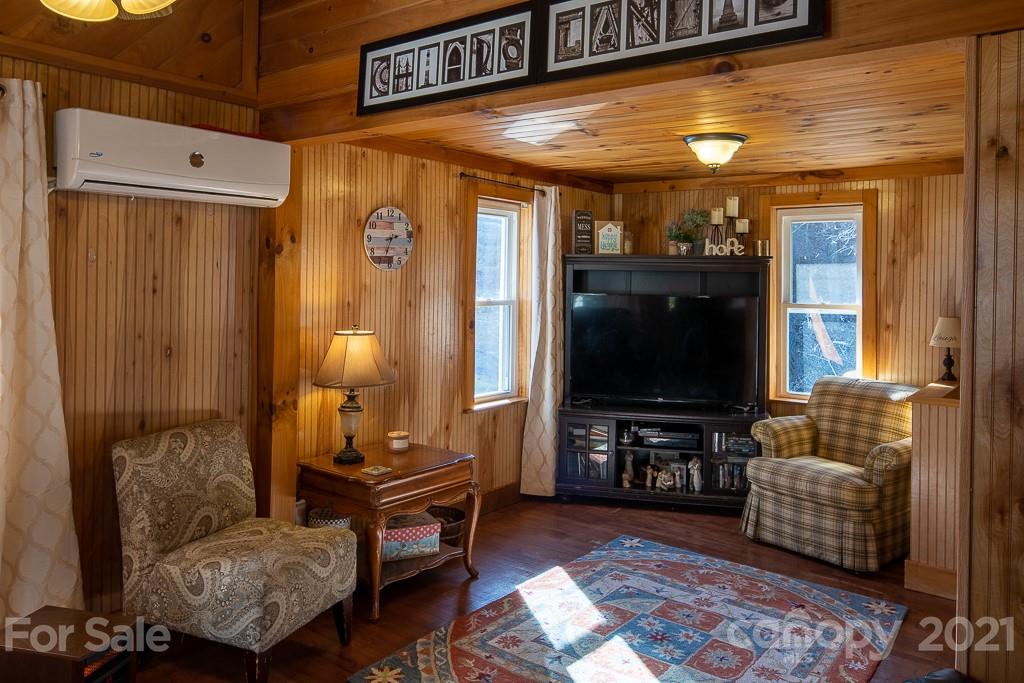 1321 Orchard Road Deep Gap, NC 28618 - Photo 6 of 40 a living room with furniture and a flat screen tv