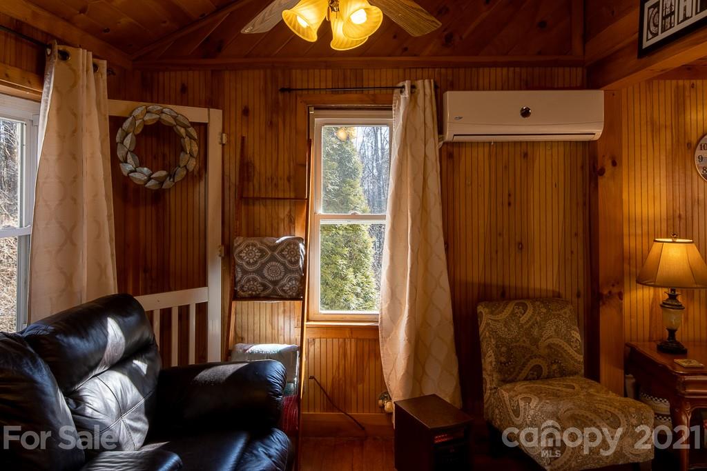 1321 Orchard Road Deep Gap, NC 28618 - Photo 7 of 40 a living room with furniture and a window