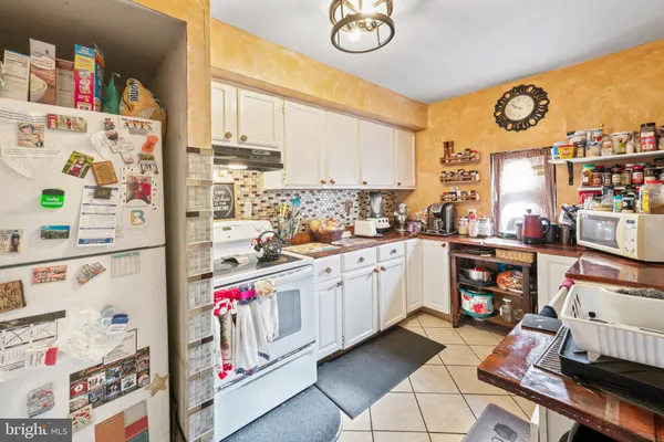 a utility room with cabinets