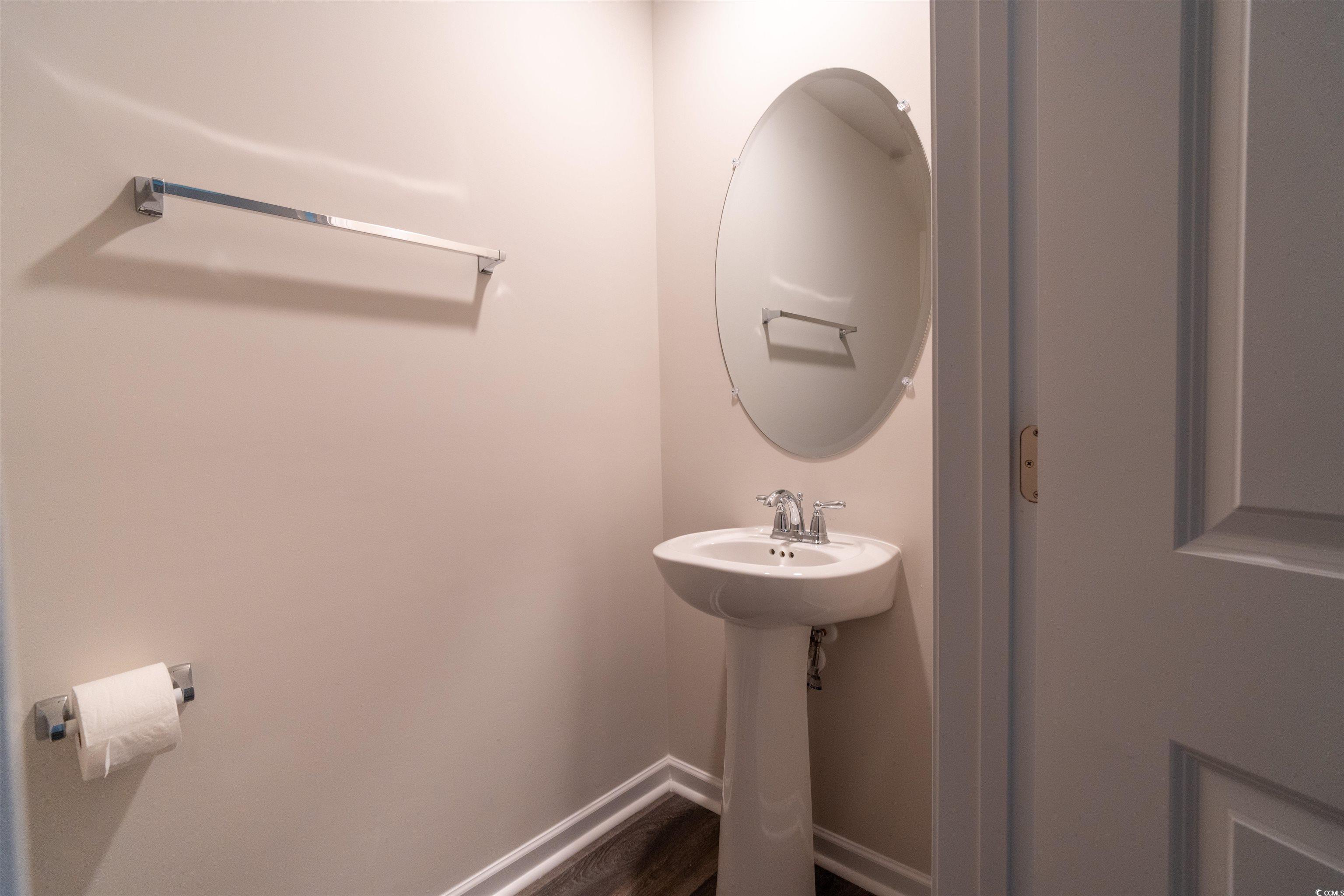 160 Harvest Gold Drive Conway, SC 29526 - Photo 17 of 37 Bathroom with baseboards and dark wood finished floors