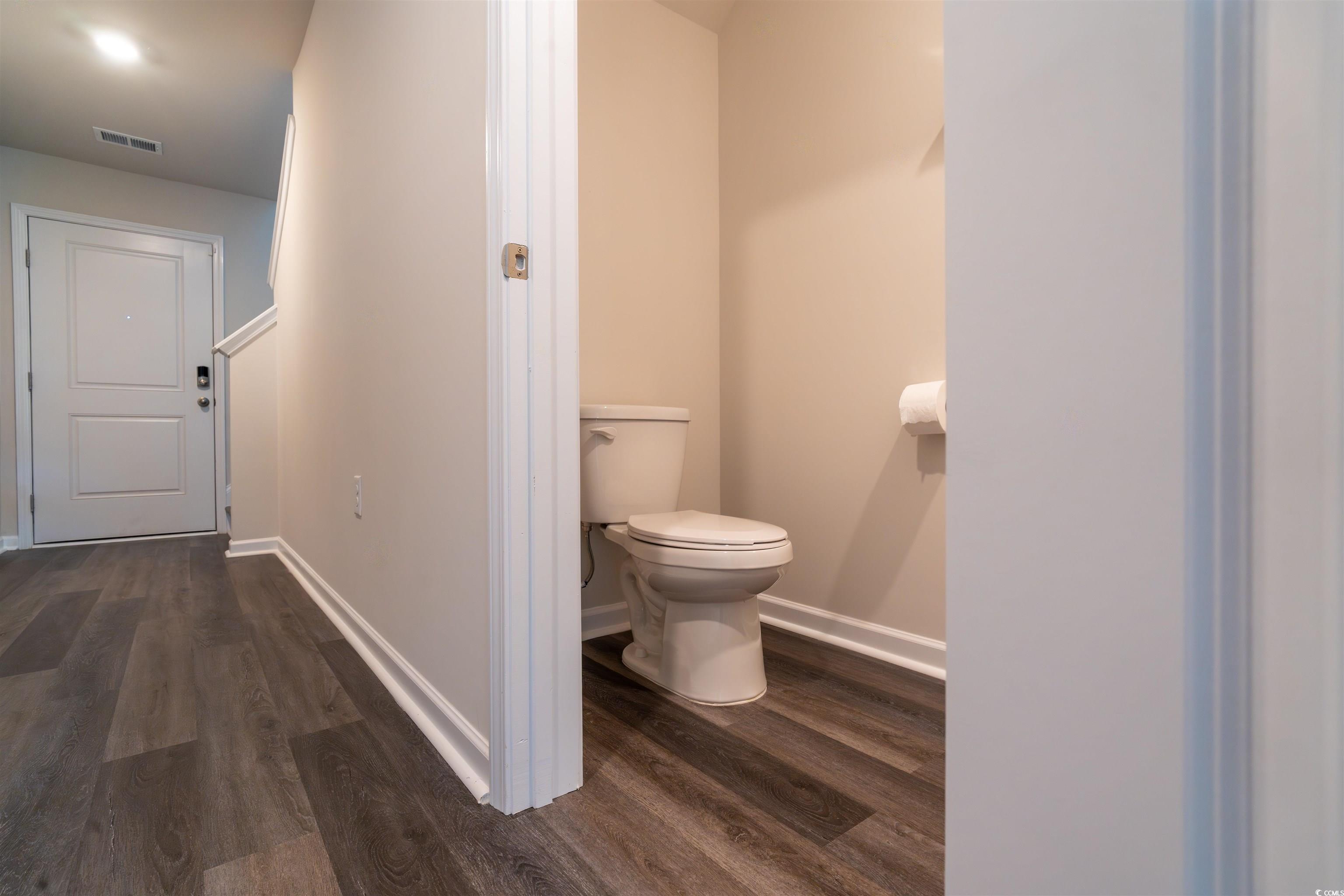 160 Harvest Gold Drive Conway, SC 29526 - Photo 18 of 37 Bathroom featuring dark wood-style flooring and baseboards