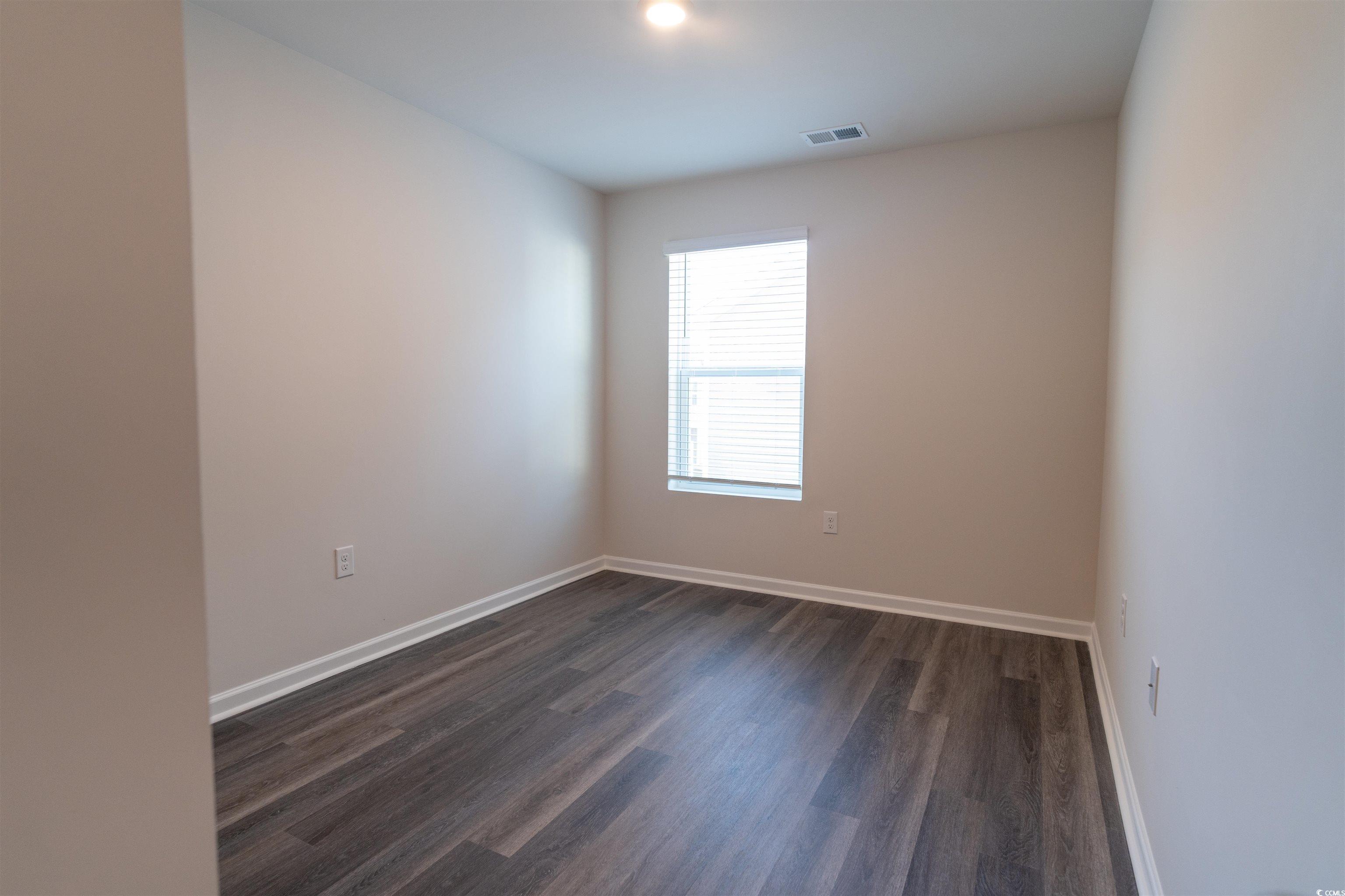 160 Harvest Gold Drive Conway, SC 29526 - Photo 26 of 37 Unfurnished room featuring dark wood-type flooring and baseboards