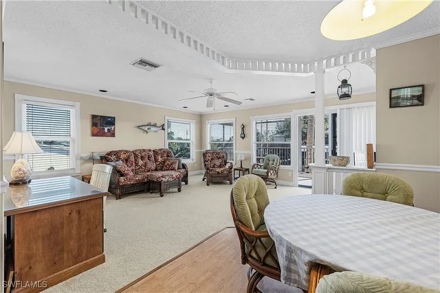 a bedroom with furniture and a wooden floor