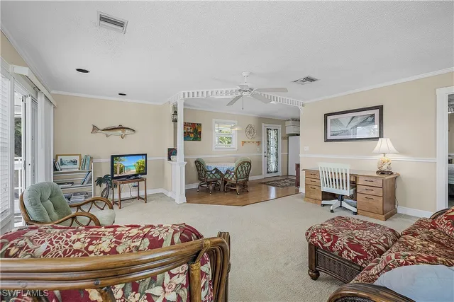 a bedroom with furniture and a table