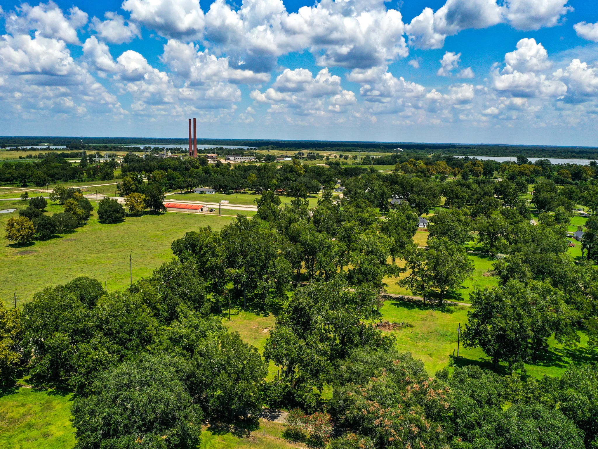 0 Texas Avenue Boling, TX 77420 - Photo 18 of 22 a view of a lake with lawn chairs