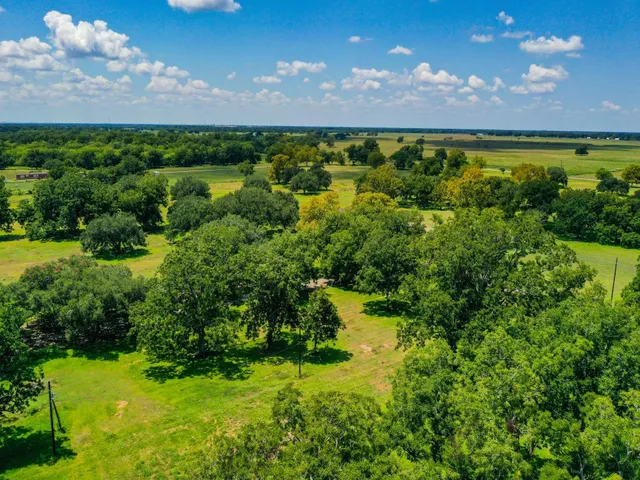 a view of a lake with a building in the background