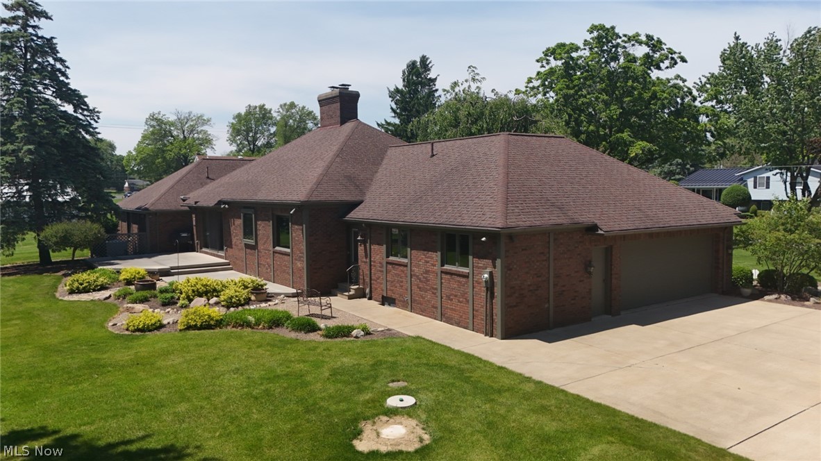 3985 Wiers Road Willard, OH 44890 - Photo 3 of 50 Red brick exterior with a multi-gabled roofline